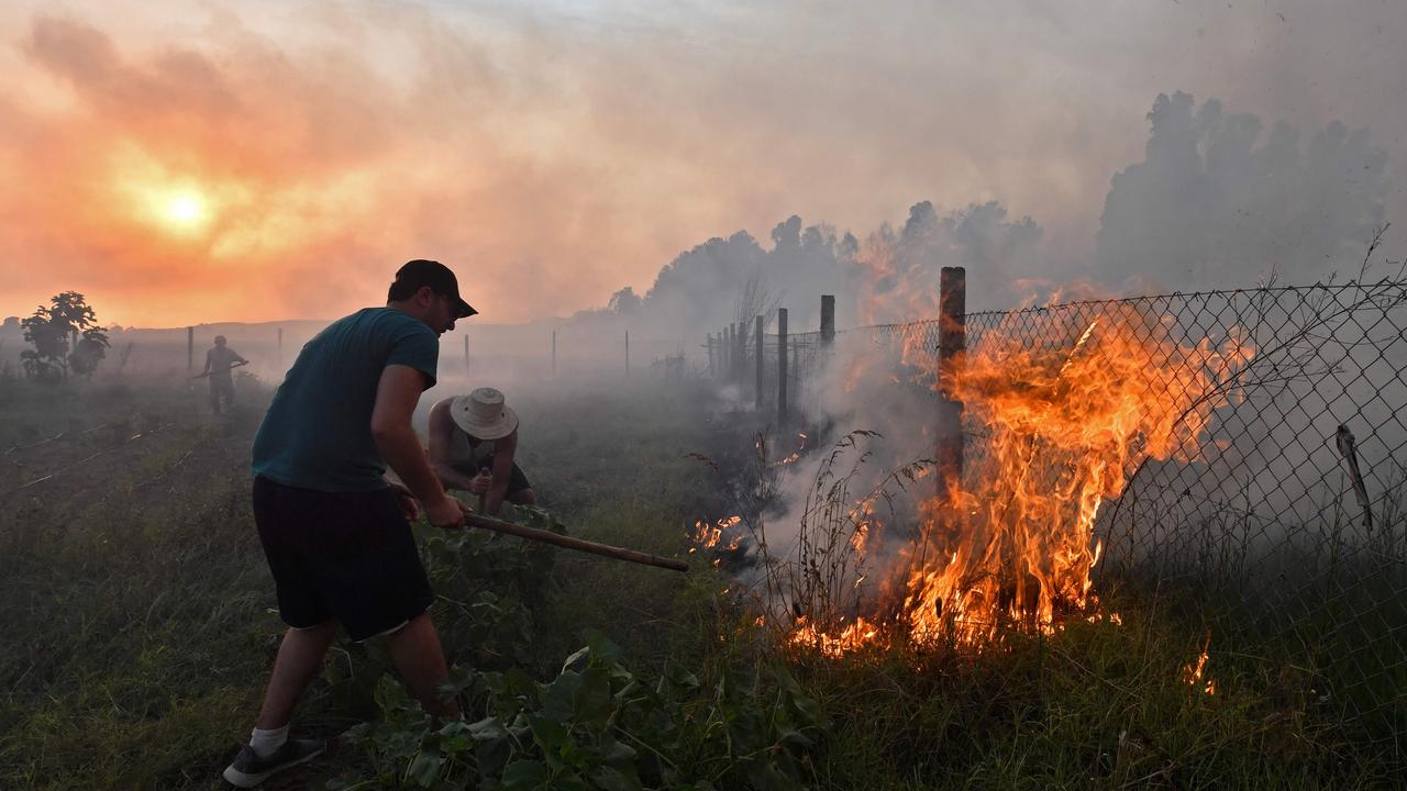 Wildfires raging across Algeria during a blistering heatwave have killed more than 30 people and forced mass evacuations, the government said. Picture: Fethi Belaid