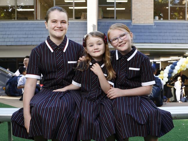 Sisters Alexandra Dolan-Gold (Year 7) Elizabeth Dolan-Gold (Kindergarten) and Charlotte Dolan-Gold (Year 4) will be among the school's first female students since last century. Picture: Richard Dobson