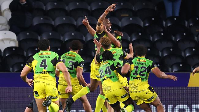 Ben Jones-Bishop celebrates with his Jamaican teammates after scoring their side’s first try. Picture: Getty Images