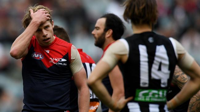 Mitch Hannan reacts to a Collingwood goal. Picture: AAP Images