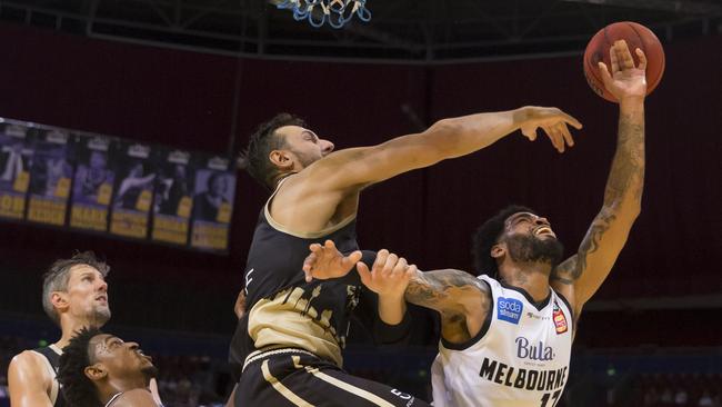 Andrew Bogut shows why Sydney’s defence was rated one of the best. 