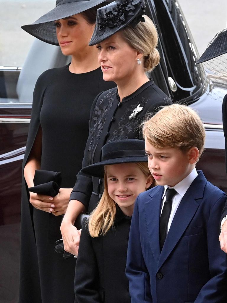 Meghan stands beside Sophie, Countess of Wessex, Princess Charlotte and Prince George at Westminster Abbey in London for the Queen’s State Funeral Service. Picture: Geoff Pugh/Pool/AFP