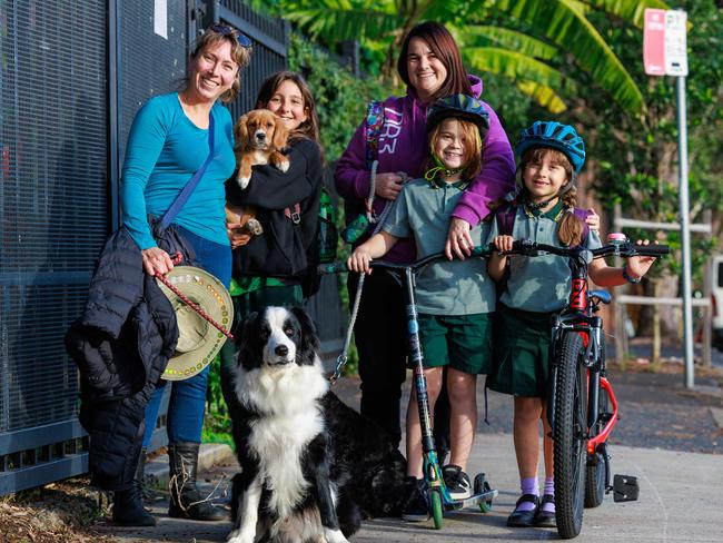 Concerned Erskineville Public School mums Danielle Goncalves and Lauren Thomas with 11-year-old Scarlett Goncalves and siblings Alfred Thomas, 8, and Florence Thomas, 7. Picture: Justin Lloyd.