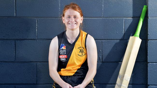 Katelyn Pope poses at Broadview Football Club oval she has switched to Aussie rules after losing her contract with SACA. She played for Broadview Football Club this Adelaide Footy League women's season and came second in the division three best and fairest count . Saturday September 14,2019.(Image AAP/Mark Brake)