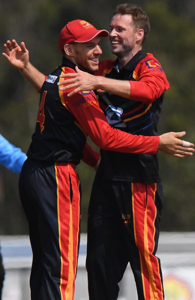 Darryn Dyer (left) pictured with former Australian cricketer Ben Laughlin.