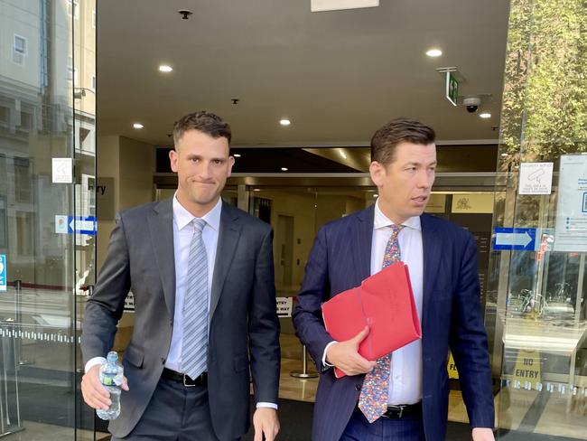 Joch McLean (left) with his lawyer (right) leaving Downing Centre District Court on March 17, 2023