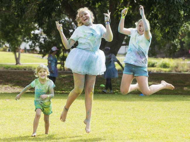 Holly Glover, Ella Glover and Alyssa Glover from Blacks Beach at the Mackay Colour Run 2021. Picture: Michaela Harlow