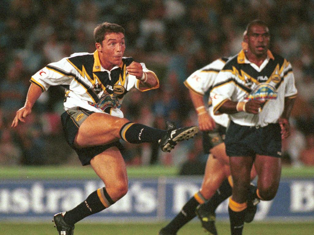 15 May 1999 picCameron/Laird Nth Qld Cowboys vs Parramatta Eels at Dairyfarmers Stadium. Paul Green kicks the ball ahead. headshot sport rugby league NRL action qld