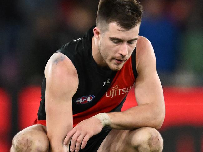 MELBOURNE, AUSTRALIA - JULY 19: Zach Merrett of the Bombers reacts on the final siren during the round 19 AFL match between Essendon Bombers and Adelaide Crows at Marvel Stadium, on July 19, 2024, in Melbourne, Australia. (Photo by Daniel Pockett/Getty Images)