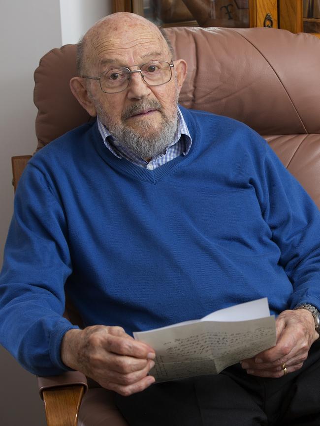 Colin Gramp in 2017 with the last letter from his father, Hugo Gramp. Picture: Dragan Radocaj