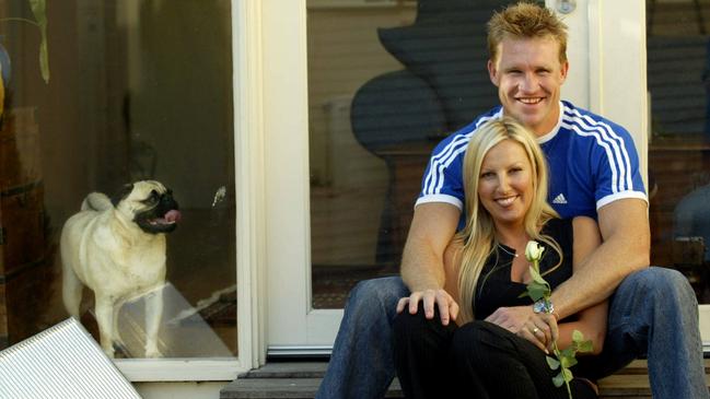 Nathan Buckley and ex-wife Tania Minnici at home with their dog Mac in 2003. Buckley says this marriage breakup was the toughest thing he has ever been through.