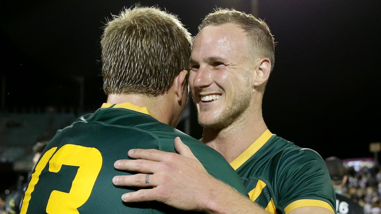 Daly Cherry-Evans and Jake Trbojevic celebrate a Kangaroos win in Wollongong. Picture: Jonathan Ng