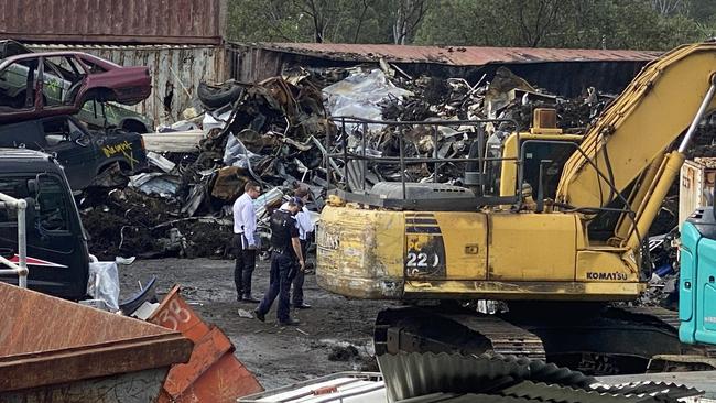 Police and fire crews are investigating after a fire broke out in a Molendinar scrap metal yard. Picture: Amaani Siddeek