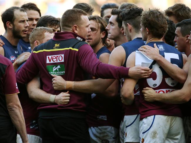 Justin Leppitsch tries to rally his players at three-quarter time. Picture: Colleen Petch