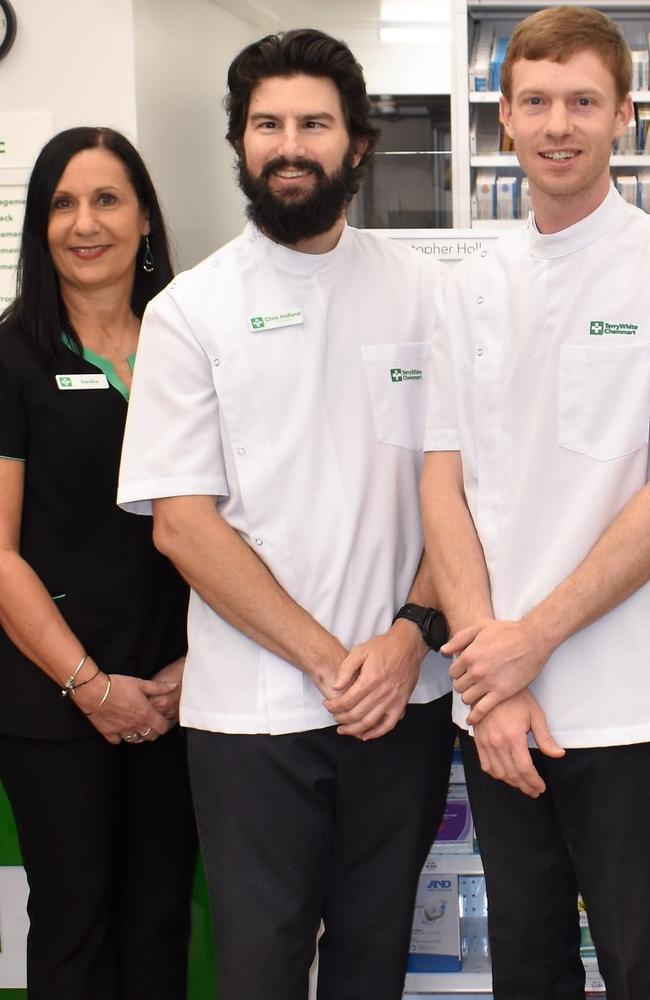 Craig Menegon and Chris Holland, co-owners of TerryWhite Chemmart Ingham, with employee Sandra Bison. Picture: Supplied