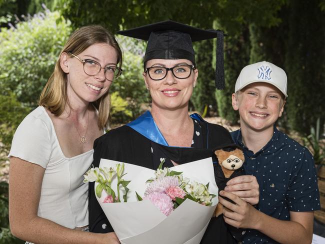 Bachelor of Nursing graduate Katrina Collie with kids Paige and Lochlan Bain at a UniSQ graduation ceremony at Empire Theatres, Tuesday, February 13, 2024. Picture: Kevin Farmer