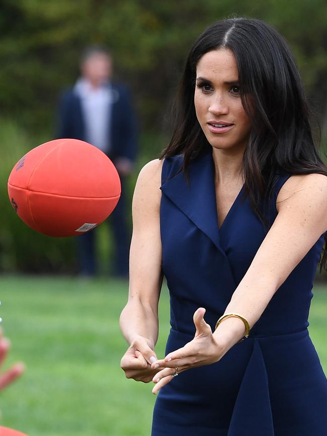 Meghan’s “worthy debut handpass”. Picture: AAP/Julian Smith