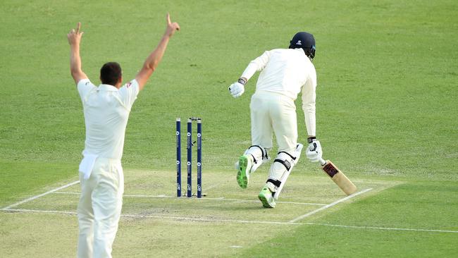 England batsman James Vince is run out by Nathan Lyon on day one of the Ashes first Test. Photo: Getty Images