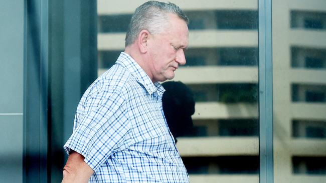 Sports scientist Stephen Dank, who was at the centre of the Essendon football supplements scandal leaves a health clinic in Darwin, Nothern Territory.