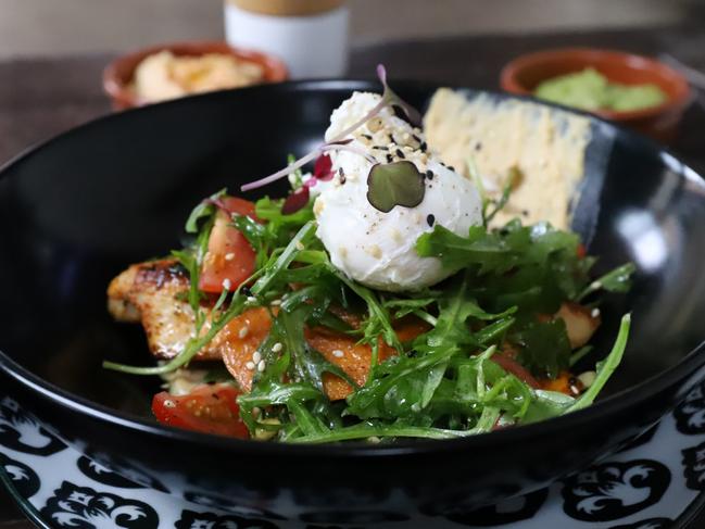 The grilled chicken salad with hummus and poached eggs. Picture: Jenifer Jagielski