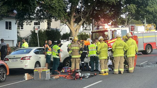 Ambulance officers at the scene. Picture: Jonathan O'Neill