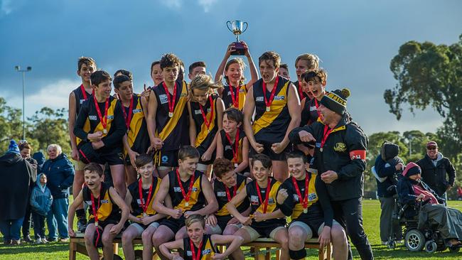 Mitcham’s under-13s celebrate their Division C flag in 2018. Picture: Mitcham Junior Football Club.