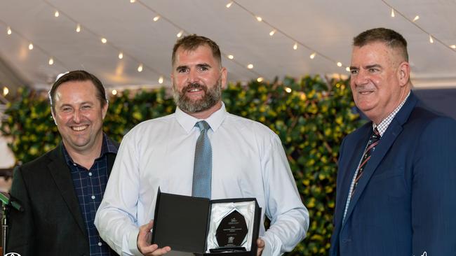 NQ Aerovation director Luke Jurgens receiving the Industry Recognition Award from Bowen Gumlu Growers CEO Ry Collins (left) and the state Minister for Agriculture Mark Furner (right) in 2023. Photo: Contributed