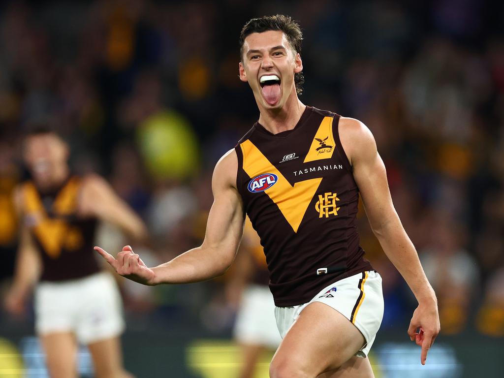 MELBOURNE, AUSTRALIA - MAY 05: Connor Macdonald of the Hawks celebrates kicking a goal during the round eight AFL match between Western Bulldogs and Hawthorn Hawks at Marvel Stadium, on May 05, 2024, in Melbourne, Australia. (Photo by Quinn Rooney/Getty Images)