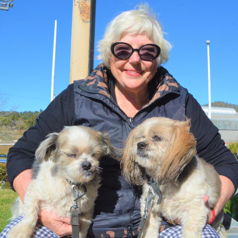 Enjoying the 2023 Toowoomba Antique Collectable Fair and Car Show is Kayleen Thorne with Chilli (left) and Rena, who travelled from Tasmania to "escape the cold" and support friends who were running a stall. Picture: Rhylea Millar