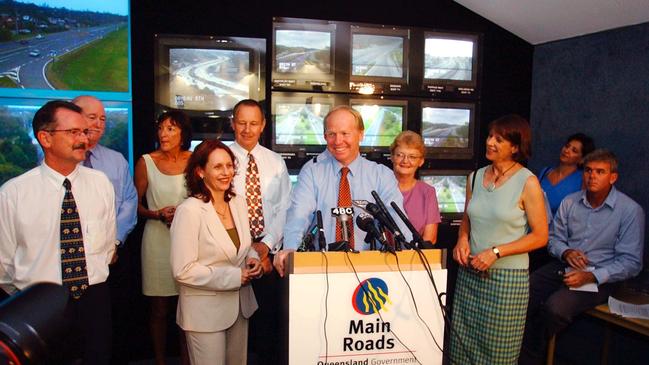 Queensland Premier Peter Beattie with Gold Coast candidates from left David Parrish, Peter Lawlor, Merri Rose, Dianne Reilly, Robert Poole, Christine Smith and Mr. Beattie's wife Heather Beattie (AAP Image/Tony Phillips)