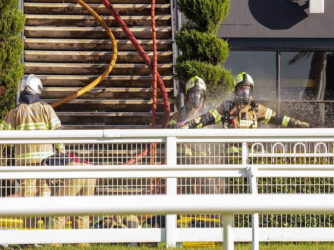 Firefighters quickly bring the blaze under control. Picture: Ian Currie