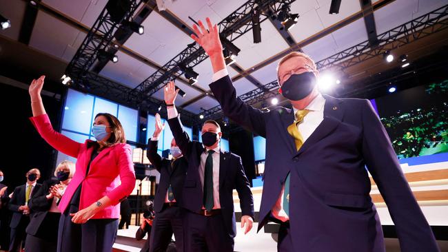 Queensland Premier Annastacia Palaszczuk, left, Brisbane Lord Mayor Adrian Schrinner and AOC president John Coates in Tokyo last week. Picture: AFP