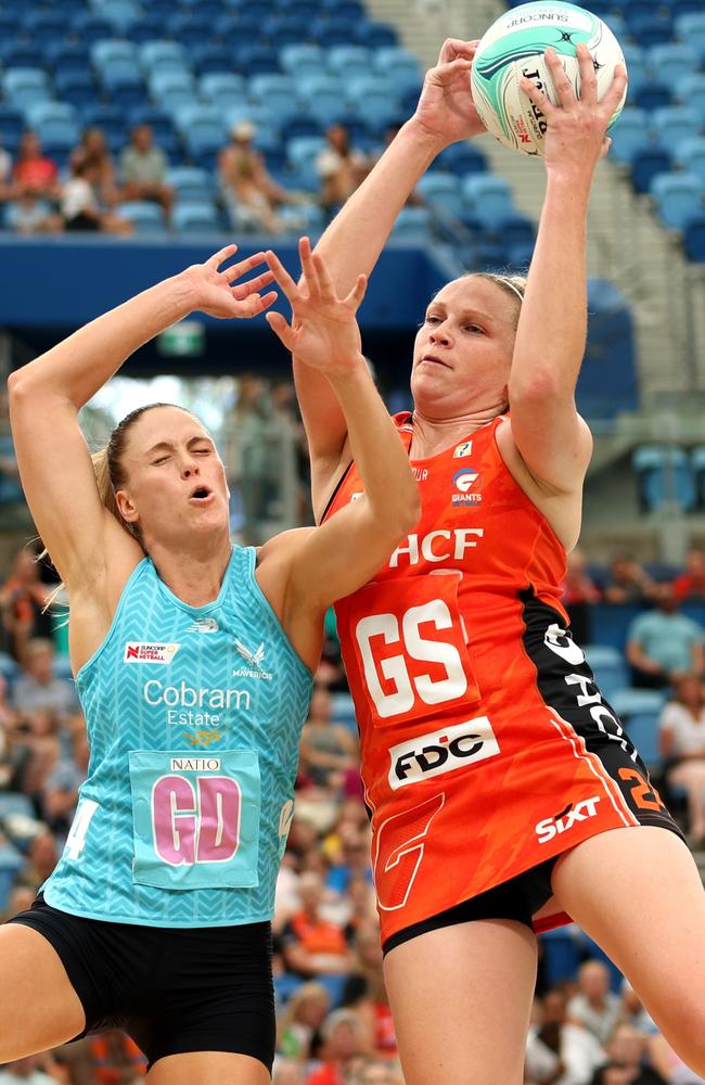 Jo Harten takes on Mavericks defender Kim Jenner during the Team Girls Cup in Sydney. Picture: Mark Metcalfe/Getty Images for Netball Australia