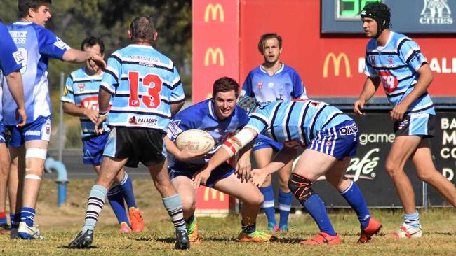 BOYS IN BLUE:   Cities fullback Jeremy Green finds the advantage line during the match against Miles/Taroom/Wandoan reserve- grade side on Sunday. Picture: Jorja McDonnell