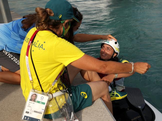 Fox’s is greeted by her mother and sister after her blistering run. Picture: Getty Images