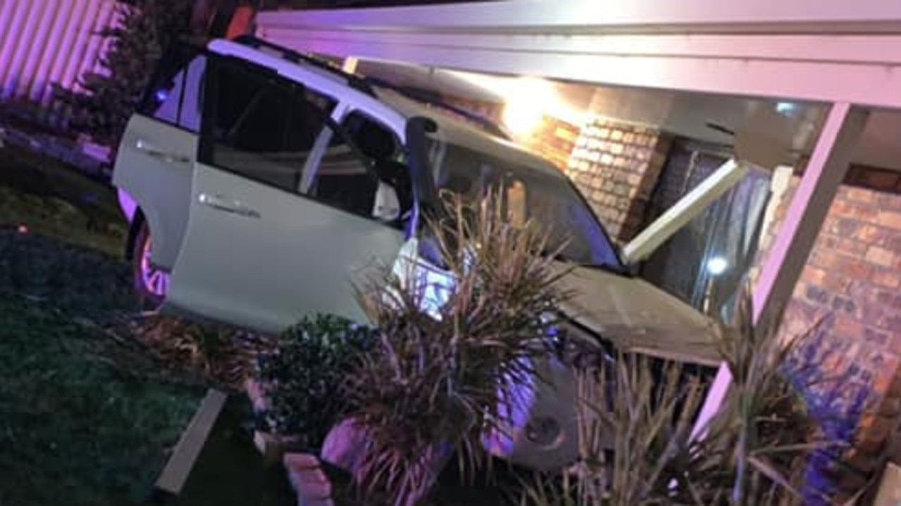 Police have arrested two people and are searching for a third after they crashed a stolen 4WD into a Oakey home overnight.