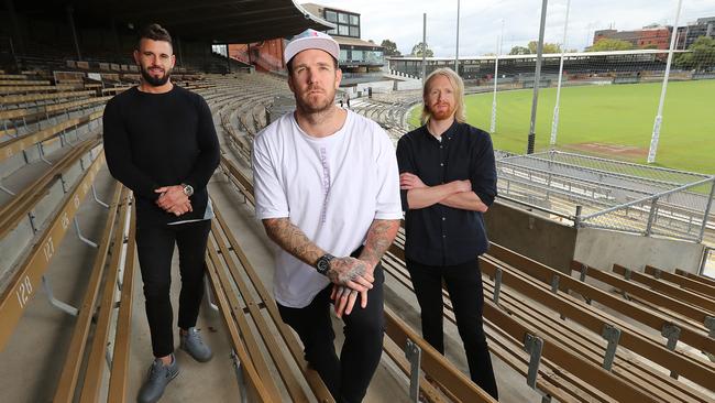 Dane Swan with Luke Udorovic and Matt O’Gorman. Picture: Alex Coppel