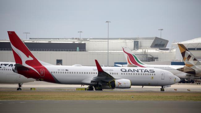 A Qantas plane sits on the tarmac at Sydney Airport last month. Picture: NCA NewsWire / Christian Gilles