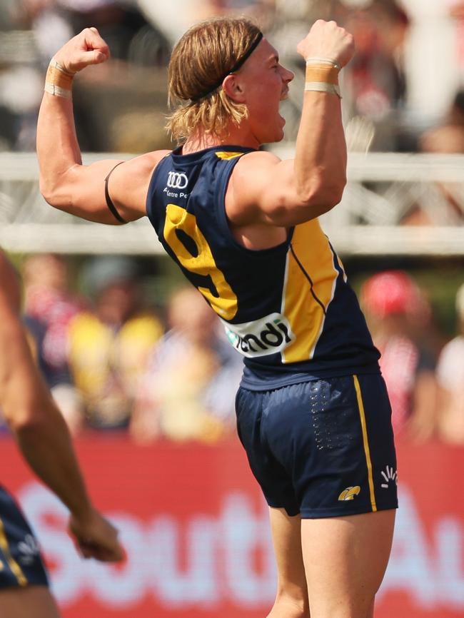 Harley Reid celebrates after kicking his first goal at AFL level against Sydney. Picture: James Elsby/Getty Images.