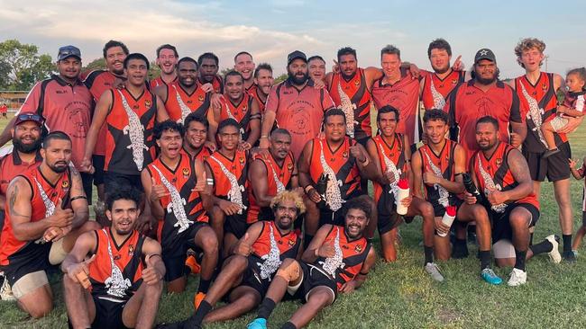 Former Essendon player Irving Mosquito with his new Port Wyndham Crocs teammates (he is standing, third from the left in the middle row). Picture: Supplied