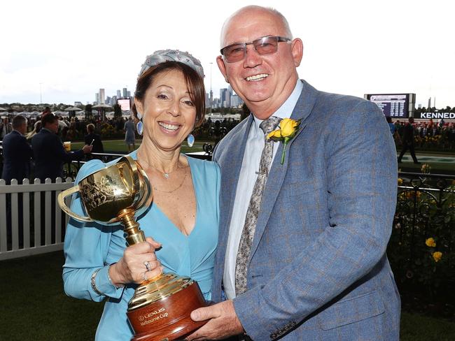 MELBOURNE . 31/10/2022.  RACING.  Melbourne Cup Day races at Flemington racecourse.  Race 7. The Melbourne Cup. (3200 mtr).  Part owner of Gold Trip Noel Greenhalgh and with Maria with the Melbourne Cup    . Picture by Michael Klein