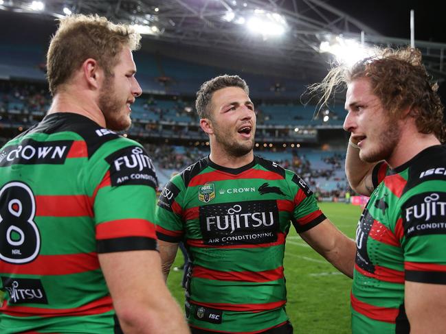Souths Sam Burgess with his brothers Tom and George after victory in the South Sydney v St. George-Illawarra NRL Semi Final at ANZ Stadium, Homebush. Picture: Brett Costello