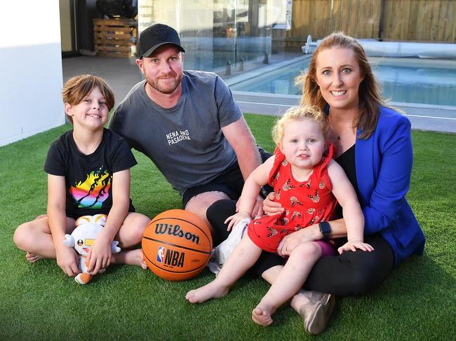 Belinda Wilson with family Ben, Iaasc, 8, and Charlotte, 2. Picture: Patrick Woods.