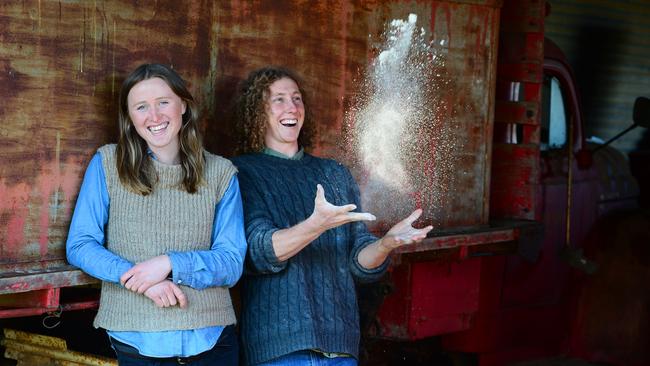 Ian Congdon and Courtney Young with stone ground rye flour.