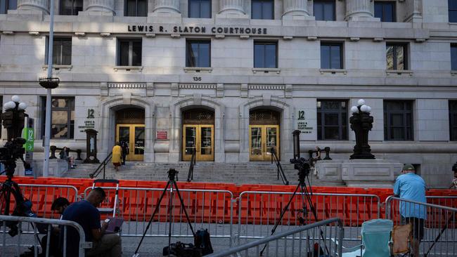 Members of the media surround the Lewis R. Slaton Courthouse. Picture: AFP.