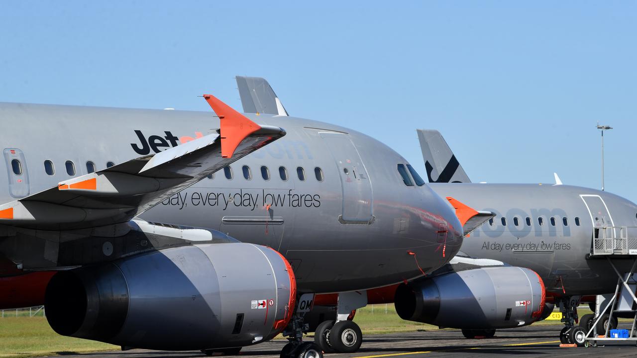 Grounded Jetstar aircraft parked at Brisbane Airport. Picture: Darren England/AAP