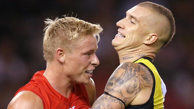 Isaac Heeney jostles with Dustin Martin earlier this season. Picture: Michael Klein.