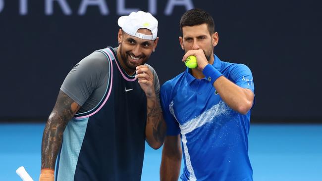 BRISBANE, AUSTRALIA - JANUARY 01: Novak Djokovic and Nick Kyrgios talks tactics during their doubles match against Michael Venus and Nikola Mektic during day four of the 2025 Brisbane International at Pat Rafter Arena on January 01, 2025 in Brisbane, Australia. (Photo by Chris Hyde/Getty Images)