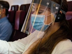 Qatar Airways has made it mandatory for economy-class passengers to wear a protective face shield on board the aircraft in addition to a mask to reduce the risk of COVID-19 spreading during flight.