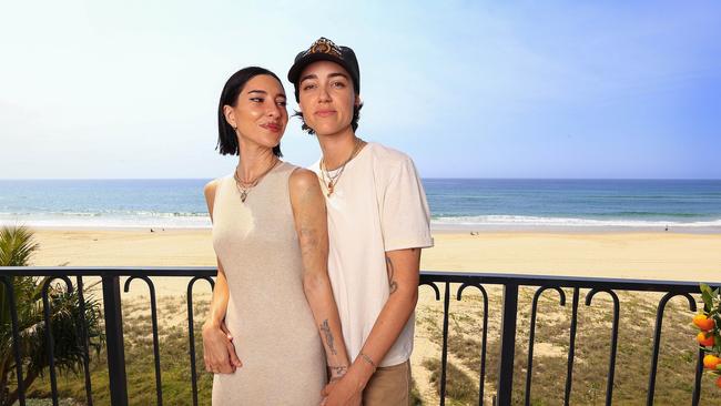 Jess Origliasso and her fiancee, Alex Smith, at the beachfront apartment they have purchased on the Gold Coast. Photo: Adam Head.